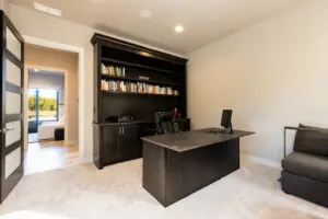 Luxury room with table chair and bookshelf