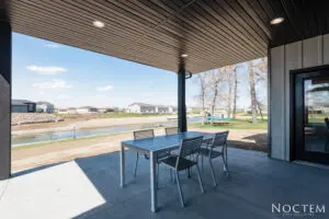 Covered area outside house with chair table set