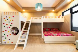 Kids bedroom with double decker beds and hanging light