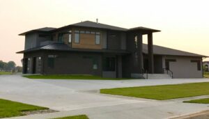 A large house with grass in front of it.