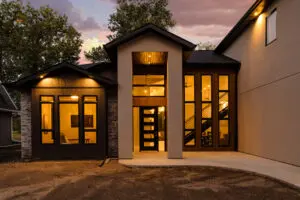 A large house with a lot of windows and doors