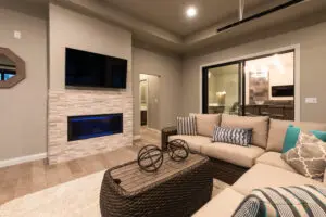 A living room with a couch and fireplace