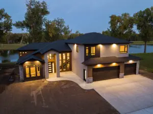 A large house with a driveway and garage.