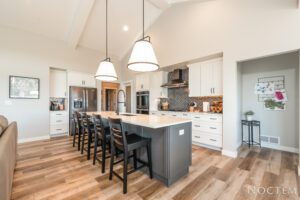 Modern kitchen island with bar stools.