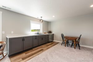 Kitchenette with table and two chairs.